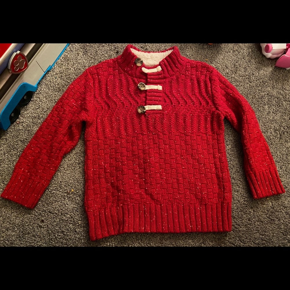 Red pull over sweater